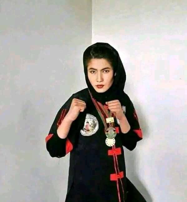 Qadria posing with her sport clothes on